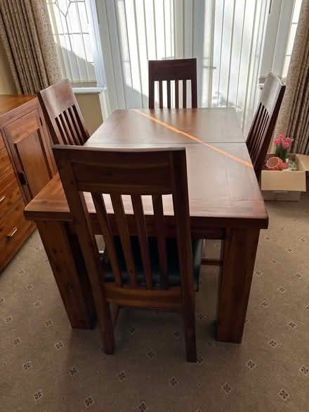 Photo of free Extending dinning table and 4 chairs (Wickford SS11) #1