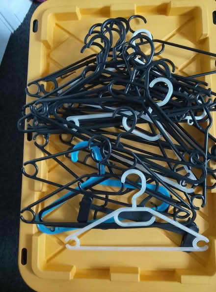 Photo of free Plastic hangers and white shoes (Battersea Sw11) #1