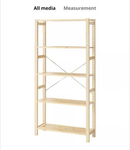 Photo of free Tall wood shelving unit (ec1v) #1