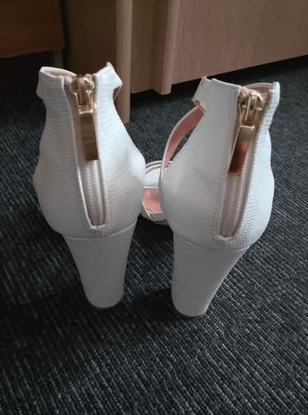 Photo of free Plastic hangers and white shoes (Battersea Sw11) #3