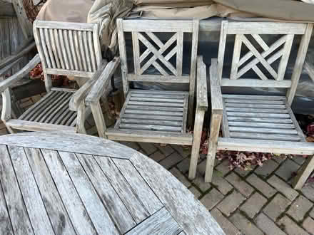 Photo of free 4 Wood patio furniture chairs (Victoria, MN) #1