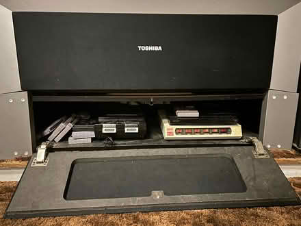 Photo of free 2002 Toshiba & entertainm't center (Hudsonville, Georgetown Forest) #2