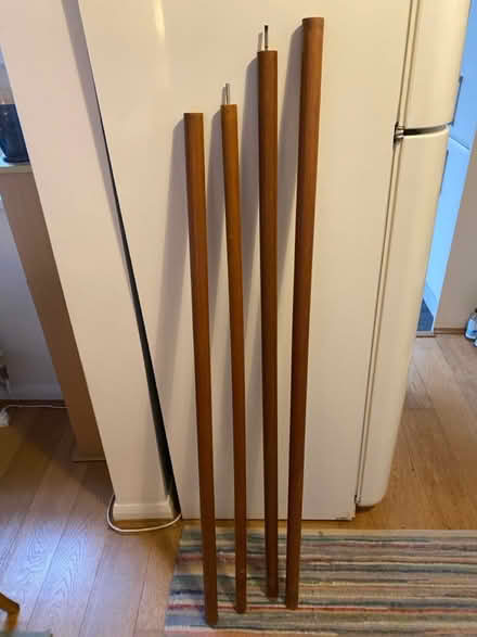 Photo of free 4 John Lewis Oak curtain poles (Penarth CF64) #1