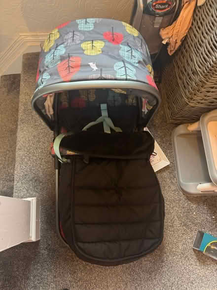 Photo of free Cosatto buggy insert and baby toys (New England) #1