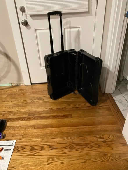 Photo of free Hard side rolling suitcase (S. 26th St. & S. Ives St) #1