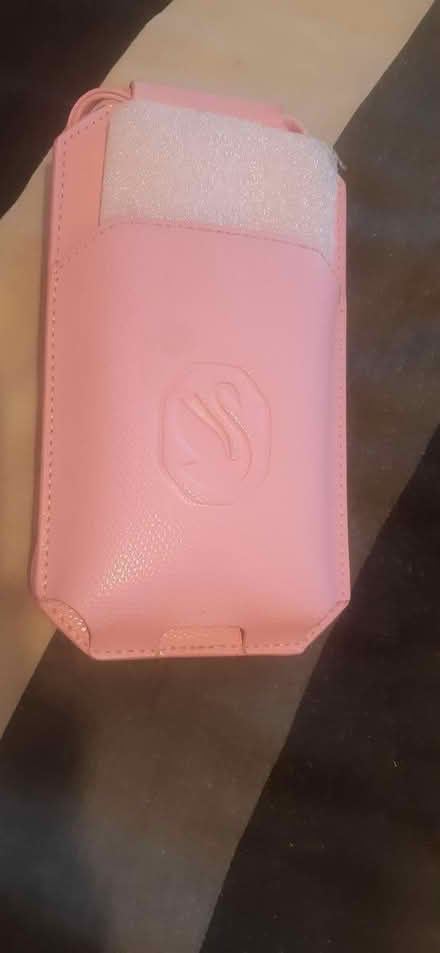 Photo of free Sworiski p7nk phone holder (KT16 chertsey) #1