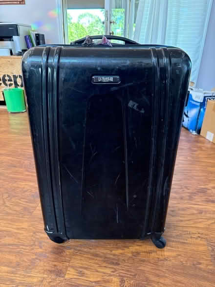 Photo of free Us traveler suit case (Longbow Dr off Carpenter) #1