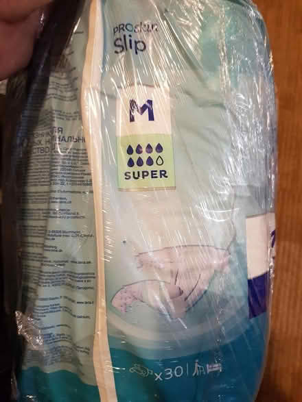 Photo of free Tena adult nappies... size M (Shepperton TW17) #3