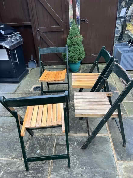Photo of free Four wooden folding chairs (Knotty Green HP9) #2