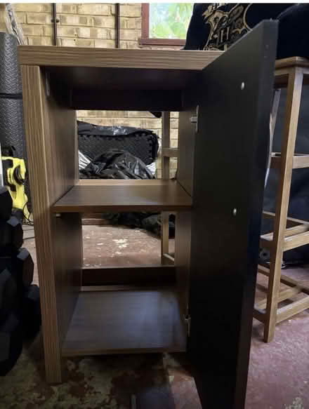 Photo of free Brown wood cupboard with black door (Slough) #2