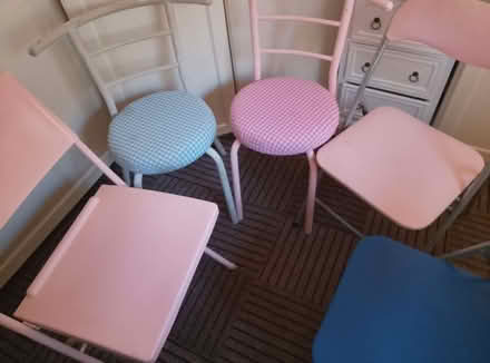 Photo of free 5 kitchen chairs 2 solid and 3 fold up ones all in fair c (Saint George's CO1) #1