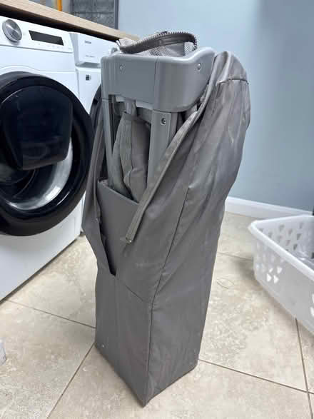 Photo of free Grey fold away Travel Cot (L16 Childwall) #2