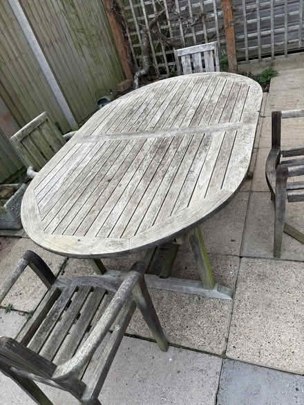 Photo of free Teak garden table and three chairs (Old Town SG1) #2