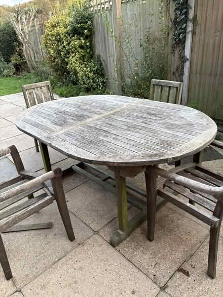 Photo of free Teak garden table and three chairs (Old Town SG1) #1