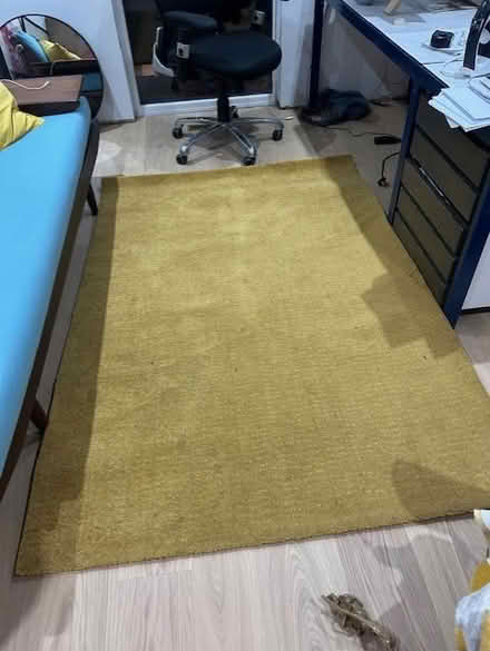 Photo of free Dark yellow rug (SE21 (West Dulwich)) #1