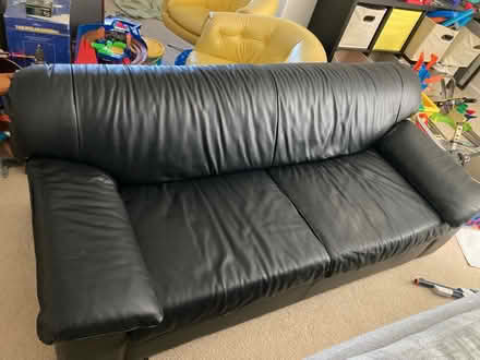 Photo of free Black leather couch (Fruitland, MD) #1