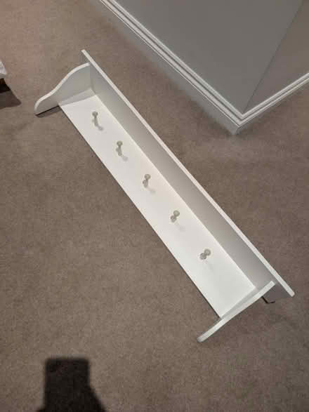 Photo of free White wood shelf with hooks (Weybridge) #2