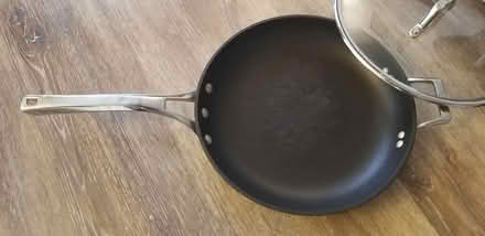 Photo of free Calphalon 12" fry pan w/ glass lid (South Fort Collins) #2