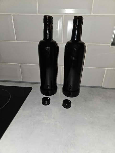 Photo of free 2 x glass bottles with tops (Handsworth) #1