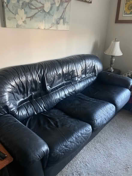 Photo of free Black Leather Couch (Painesville Cobblestone Court) #1