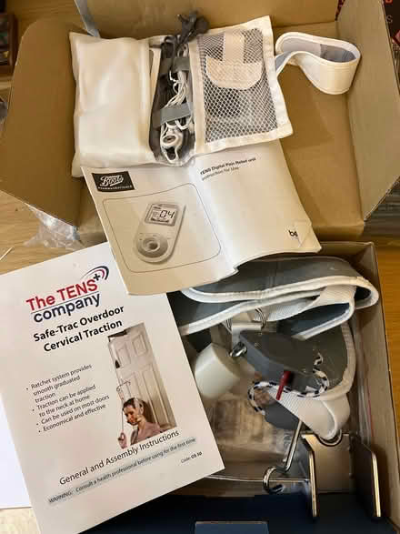 Photo of free TENS machine and neck pain traction (Mortimer RG7) #1