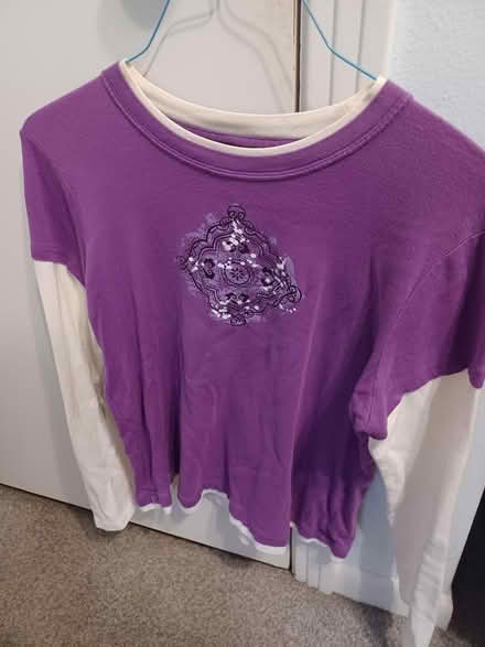 Photo of free Women's long sleeve shirt (Travis Heights) #1