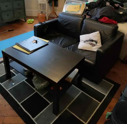 Photo of free Mini black leather sofa (Streatham common) #1