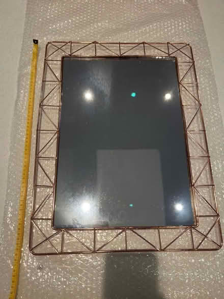 Photo of free Rose gold mirror - new (Pirbright) #1