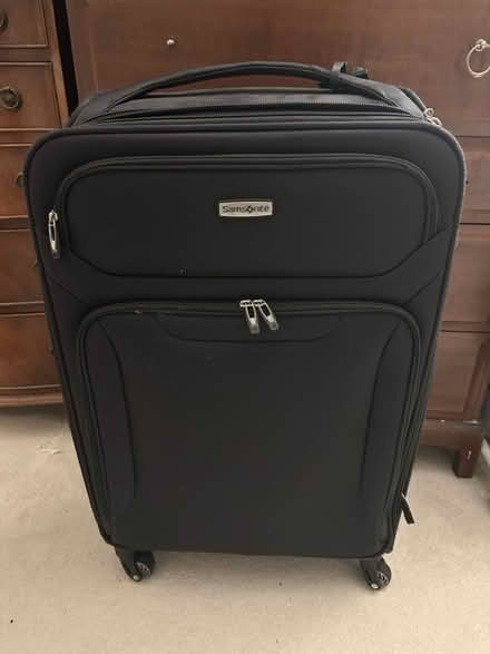 Photo of free 4 wheel large suitcase (Hammersmith W6) #1