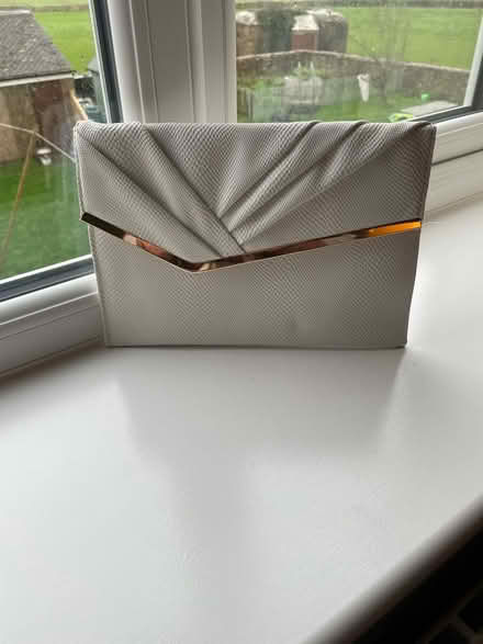 Photo of free White clutch bag (Avening GL8) #1