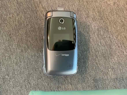 Photo of free Basic small LG flip phone (Lewes, DE near Lowe’s) #1