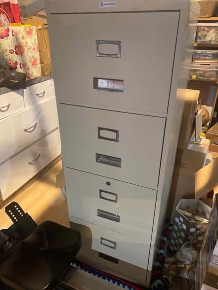 Photo of free Four drawer metal file cabinet (Nepean) #1