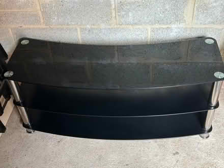 Photo of free Black glass tv stand (Bicester OX26) #1