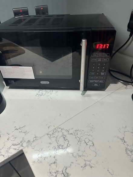 Photo of free Microwave Delonghi (Mole Valley Dorking) #1