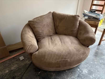 Photo of free Brown swivel love chair sofa (Shepshed) #1