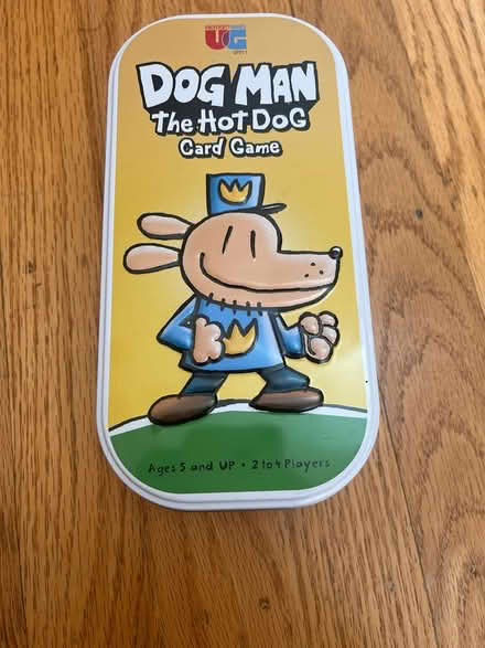 Photo of free Dog Man Tin (Lawrence Expwy & Monroe Street) #1