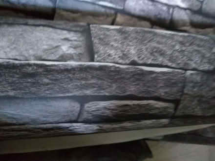 Photo of free Black/grey brick effect wallpaper (Newent GL18) #1