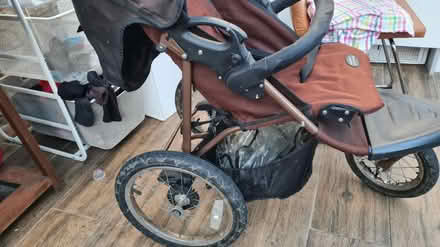 Photo of free 3 wheel buggy with raincover (Lancaster freehold) #2