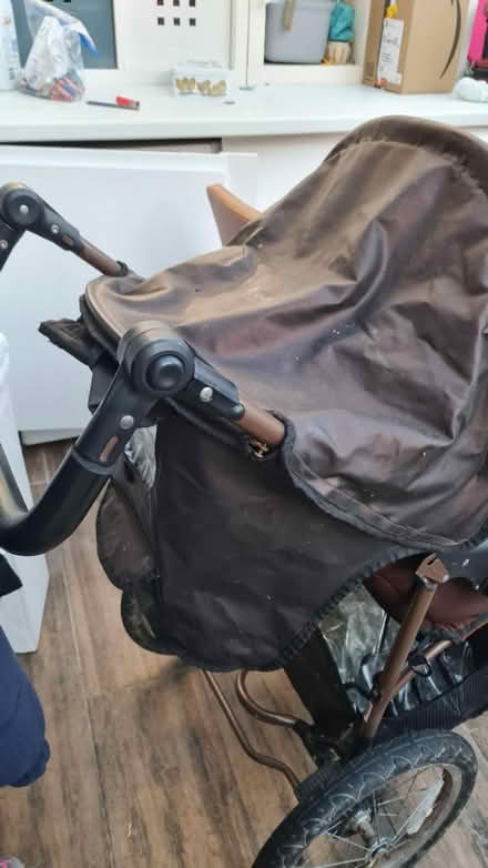 Photo of free 3 wheel buggy with raincover (Lancaster freehold) #3