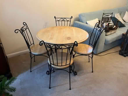 Photo of free Wood & wrought iron table + chairs (Godalming GU7) #1