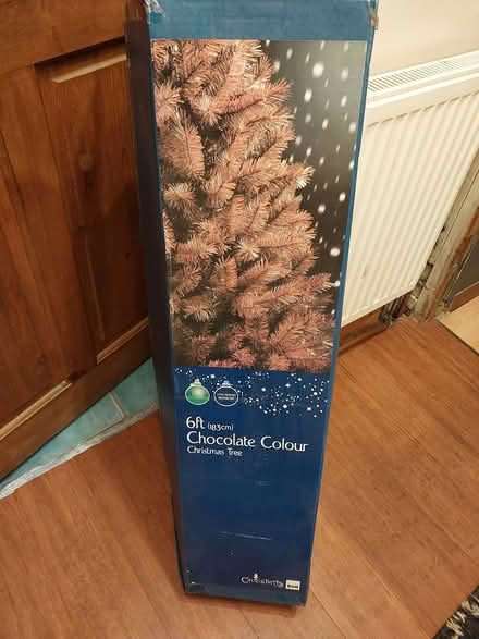 Photo of free Six foot artificial Christmas tree - chocolate coloured (Warkton NN16) #1