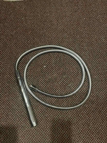 Photo of free hand held shower nozzle (Rockville) #1