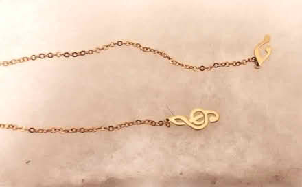 Photo of free misc: Dumbledore card; necklace etc (Davis/Teele Square area) #2