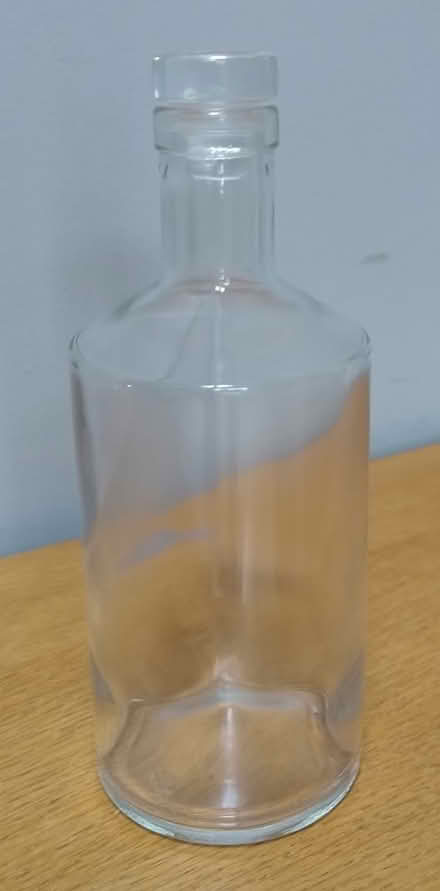 Photo of free Clear glass bottle (Sherfield on Loddon, RG27 0) #1