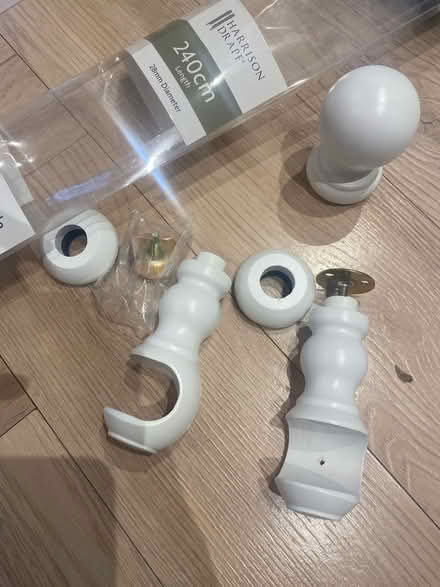 Photo of free 2 white curtain brackets and finial (Horsham RH13) #1