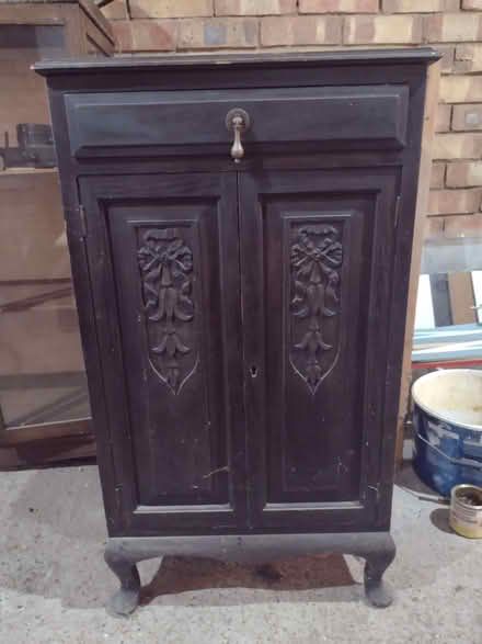 Photo of free Dark wood carved cabinet (Leigh Beck SS8) #1