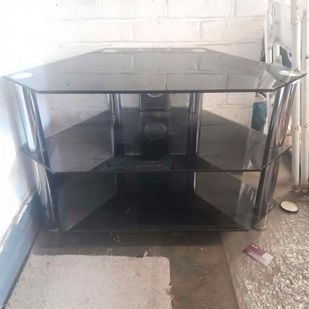 Photo of free Smoked toughened glassTV stand (Franklands Village RH17) #1