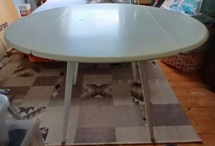 Photo of free Round, white drop-leaf Ercol table (East Dulwich, SE22) #1