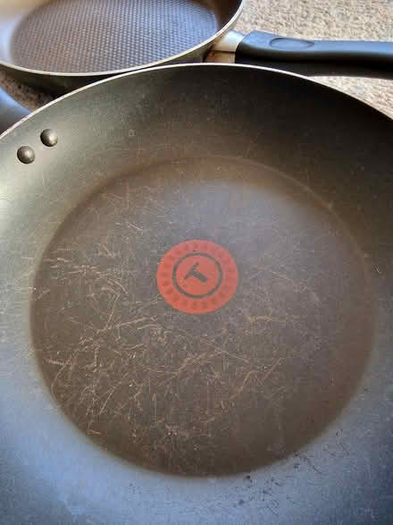 Photo of free Two frying pans - 24 & 26.5cm (Woking GU22 9) #2