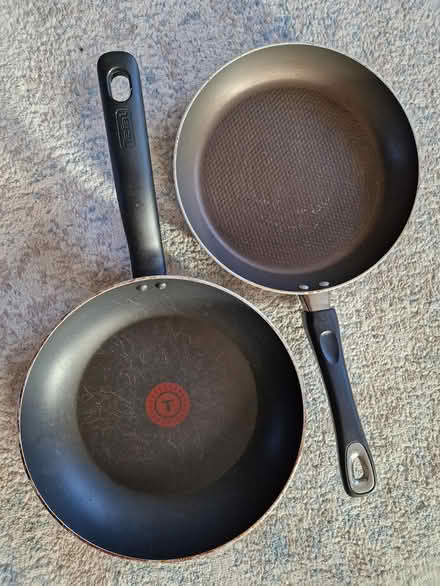 Photo of free Two frying pans - 24 & 26.5cm (Woking GU22 9) #1